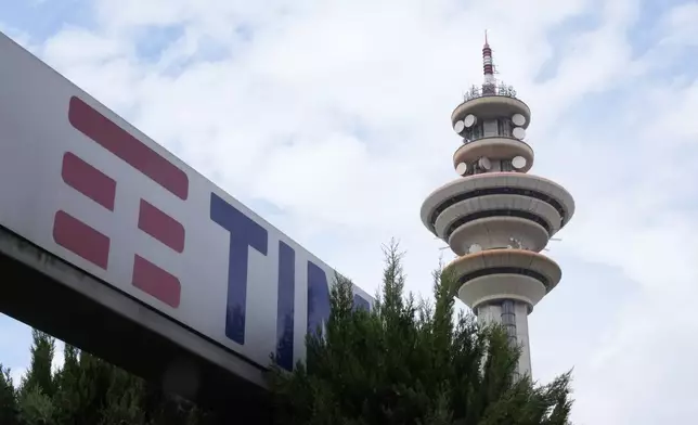 A view of the Tim Italia headquarters (Telecom Italia Mobile), in Rozzano, near Milan, Italy, Friday, May 24, 2024. An Associated Press analysis found the number of publicly-traded “zombie” companies — those so laden with debt they're struggling to pay even the interest on their loans — has soared to nearly 7,000 around the world, including 2,000 in the United States. (AP Photo/Antonio Calanni)