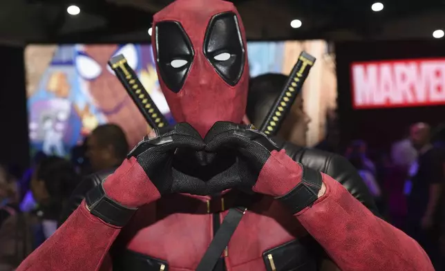 Jesus Rodriquez dressed as Deadpool poses at Comic-Con International on Thursday, July 25, 2024, in San Diego. (Photo by Richard Shotwell/Invision/AP)