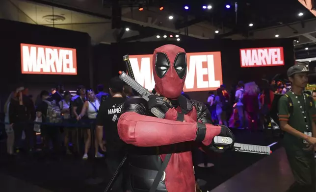 Jesus Rodriquez dressed as Deadpool poses at Comic-Con International on Thursday, July 25, 2024, in San Diego. (Photo by Richard Shotwell/Invision/AP)