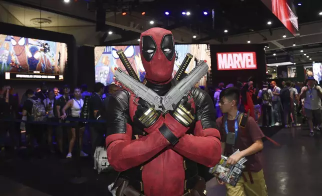 Jesus Rodriquez dressed as Deadpool poses at Comic-Con International on Thursday, July 25, 2024, in San Diego. (Photo by Richard Shotwell/Invision/AP)