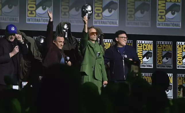 Kevin Feige, from left, Joe Russo, Robert Downey Jr., and Anthony Russo attend a panel for "Marvel Studios" during Comic-Con International on Saturday, July 27, 2024, in San Diego. (Photo by Richard Shotwell/Invision/AP)