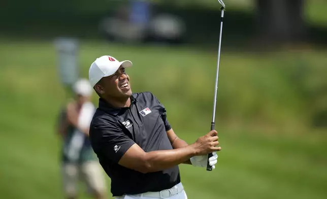 Jhonattan Vegas hits on the fairway on the seventh hole during the final round of the 3M Open golf tournament at the Tournament Players Club, Sunday, July 28, 2024, in Blaine, Minn. (AP Photo/Charlie Neibergall)