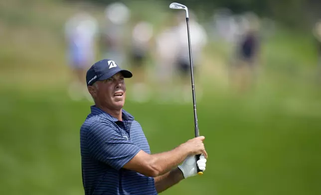 Matt Kuchar hits on the fairway on the seventh hole during the final round of the 3M Open golf tournament at the Tournament Players Club, Sunday, July 28, 2024, in Blaine, Minn. (AP Photo/Charlie Neibergall)