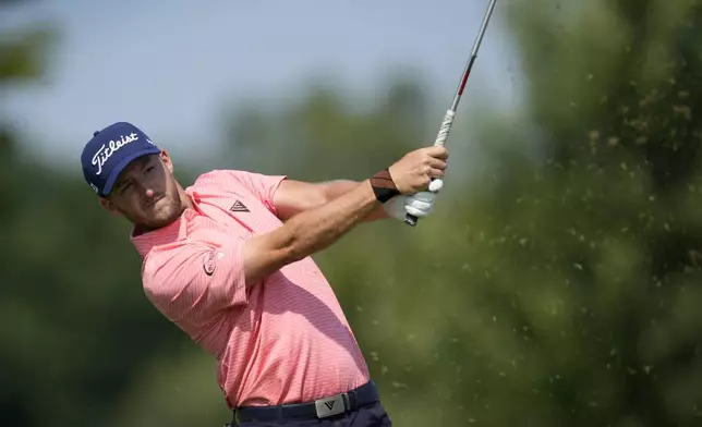 Lee Hodges hits off the tee on the fourth hole during the first round of the 3M Open golf tournament at the Tournament Players Club, Thursday, July 25, 2024, in Blaine, Minn. (AP Photo/Charlie Neibergall)