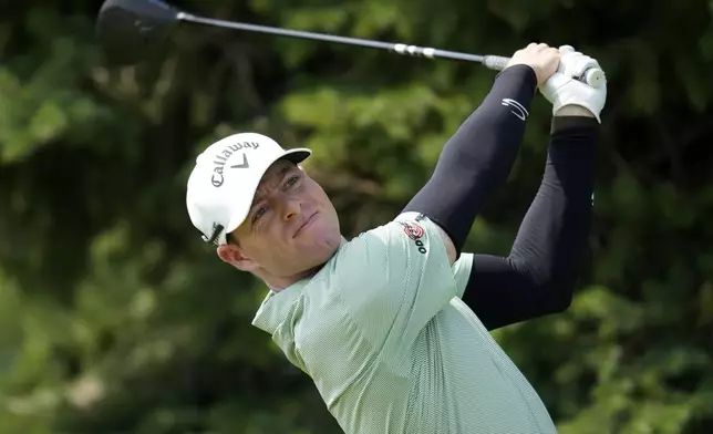 Max Greyserman hits off the tee on the second hole during the final round of the 3M Open golf tournament at the Tournament Players Club, Sunday, July 28, 2024, in Blaine, Minn. (AP Photo/Charlie Neibergall)