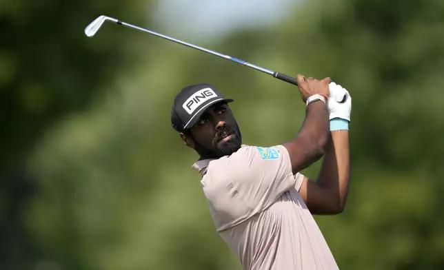 Sahith Theegala hits off the tee on the fourth hole during the first round of the 3M Open golf tournament at the Tournament Players Club, Thursday, July 25, 2024, in Blaine, Minn. (AP Photo/Charlie Neibergall)