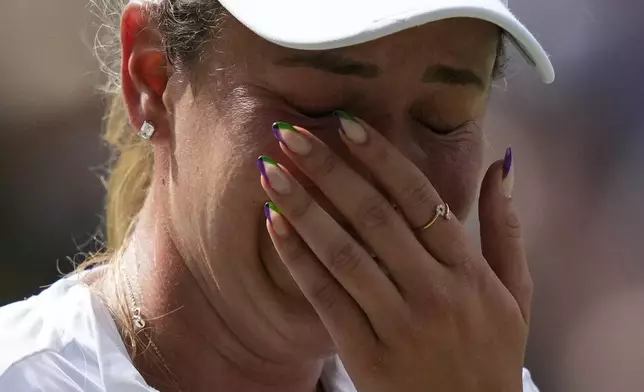 Donna Vekic of Croatia reacts after loosing a point against Jasmine Paolini of Italy during their semifinal match at the Wimbledon tennis championships in London, Thursday, July 11, 2024. (AP Photo/Mosa'ab Elshamy)