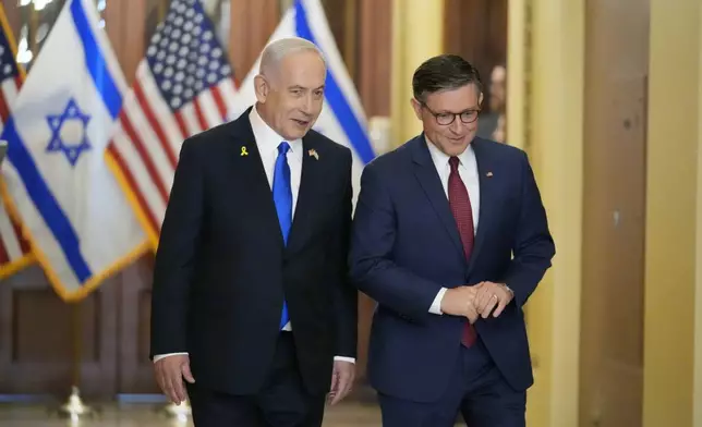 Israeli Prime Minister Benjamin Netanyahu is welcomed by Speaker of the House Mike Johnson, R-La., to the Capitol in Washington, Wednesday, July 24, 2024. Netanyahu wants to boost U.S. support during his speech to Congress today but faces protests and lawmaker boycotts. (AP Photo/J. Scott Applewhite)