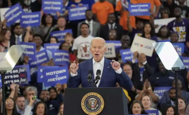 President Joe Biden gestures while speaking to supporters at a campaign event at Renaissance High School in Detroit, Friday, July 12, 2024, in Detroit. (AP Photo/Carlos Osorio)