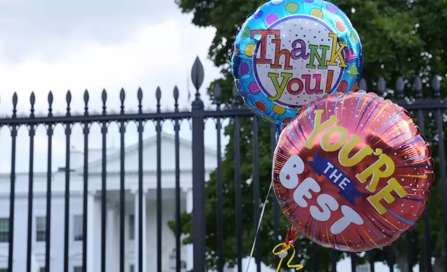 Balloons for President Joe Biden are brought to the White House in Washington, Sunday, July 21, 2024. Biden dropped out of the 2024 race for the White House on Sunday, ending his bid for reelection following a disastrous debate with Donald Trump that raised doubts about his fitness for office just four months before the election. (AP Photo/Susan Walsh)