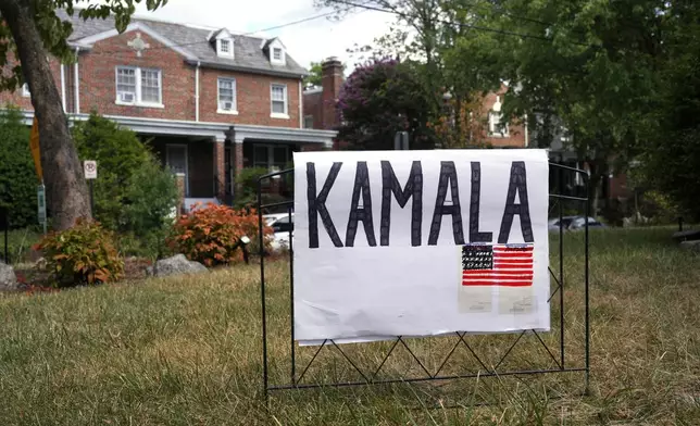 A handmade sign for Vice President Kamala Harris appears on a lawn, Sunday, July 21, 2024, in Washington. She’s already broken barriers, and now Harris could soon become the first Black woman to head a major party's presidential ticket after President Joe Biden’s ended his reelection bid. The 59-year-old Harris was endorsed by Biden on Sunday, after he stepped aside amid widespread concerns about the viability of his candidacy. (AP Photo/Jacquelyn Martin)