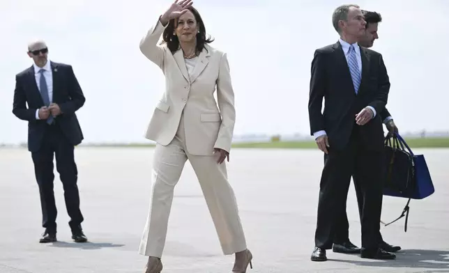 Vice President Kamala Harris arrives at Indianapolis International Airport, Wednesday, July 24, 2024 in Indianapolis. Harris is in Indianapolis to give a keynote speech at Zeta Phi Beta Sorority, Inc.'s Grand Boul' event. (Brendan Smialowski/Pool via AP)