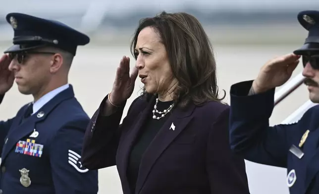 Vice President Kamala Harris steps off of Air Force Two upon arrival at Andrews Air Force Base, Md., Thursday, July 25, 2024. Harris is returning to Washington from Texas and she is scheduled to meet with Israeli Prime Minister Benjamin Netanyahu. (Brendan Smialowski/Pool via AP)