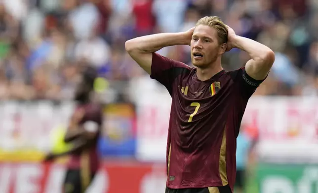 Belgium's Kevin De Bruyne gestures after missing a chance during a round of sixteen match between France and Belgium at the Euro 2024 soccer tournament in Dusseldorf, Germany, Monday, July 1, 2024. (AP Photo/Hassan Ammar)