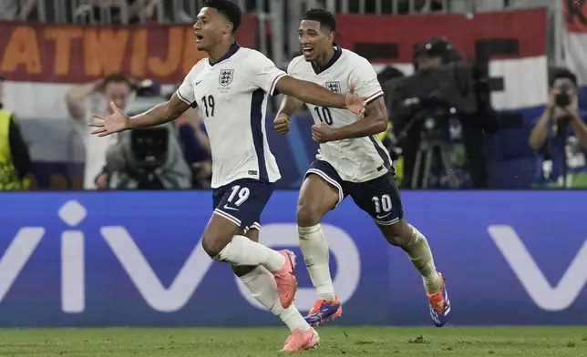 England's Ollie Watkins celebrates after scoring his side's 2nd goal against Netherlands during a semifinal at the Euro 2024 soccer tournament in Dortmund, Germany, Wednesday, July 10, 2024. (AP Photo/Thanassis Stavrakis)