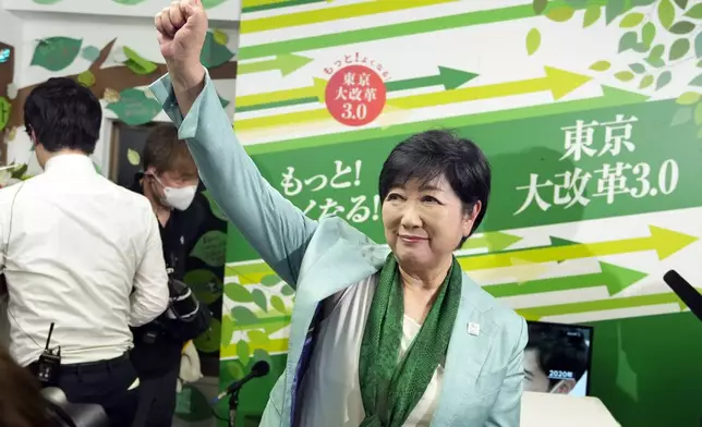 Incumbent Tokyo Gov. Yuriko Koike celebrates after she was elected for Tokyo's gubernatorial election in Tokyo, Sunday, July 7, 2024. (AP Photo/Hiro Komae)