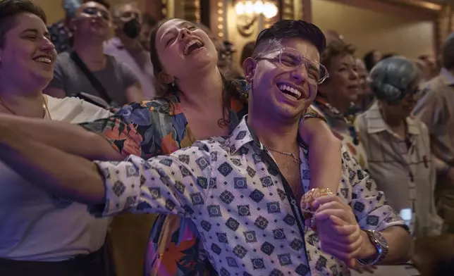 Worshippers sing with Rabbi Sharon Kleinbaum, not pictured, during her last service at the Masonic Hall, on Friday, June 28, 2024, in New York. (AP Photo/ Andres Kudacki)