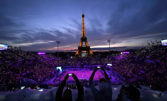 in a beach volleyball match at the 2024 Summer Olympics, Saturday, July 27, 2024, in Paris, France. (AP Photo/Robert F. Bukaty)