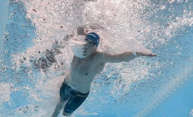 Lukas Maertens, of Germany, competes in the men's 400-meter freestyle final at the 2024 Summer Olympics, Saturday, July 27, 2024, in Nanterre, France. Maertens won gold. (AP Photo/David J. Phillip)