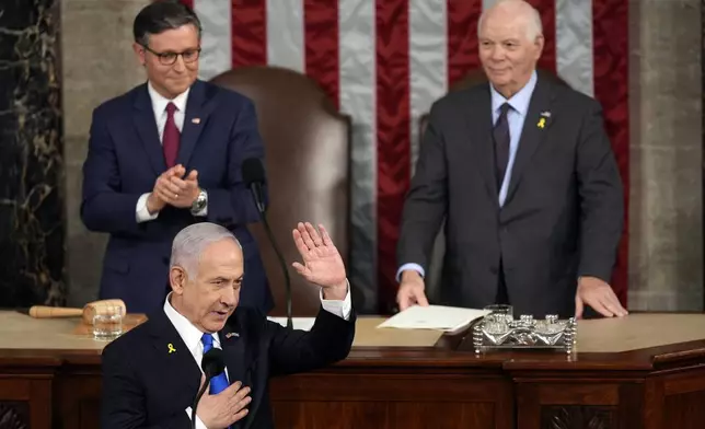 Israeli Prime Minister Benjamin Netanyahu speaks to a joint meeting of Congress at the Capitol in Washington, Wednesday, July 24, 2024, as House Speaker Mike Johnson of La., and Senate Foreign Relations Chair Ben Cardin, D-Md., watch. (AP Photo/Julia Nikhinson)