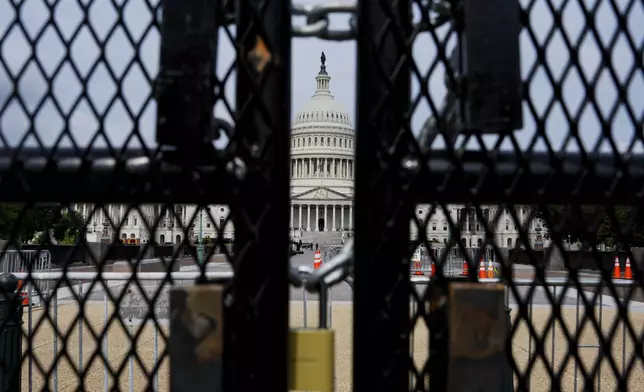 The U.S. Capitol is seen behind a security fence ahead of Israeli Prime Minister Benjamin Netanyahu's speech to a joint meeting of Congress to seek support for Israel's fight against Hamas and other adversaries, Wednesday, July 24, 2024, in Washington. (AP Photo/Julia Nikhinson)