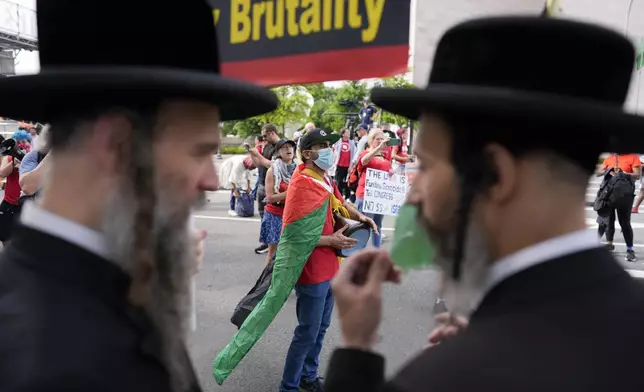 Hasidic Jews and others protest Israeli Prime Minister Benjamin Netanyahu's polices, near the U.S. Capitol ahead of a scheduled visit by Netanyahu, Wednesday, July 24, 2024, in Washington. (AP Photo/Mike Stewart)