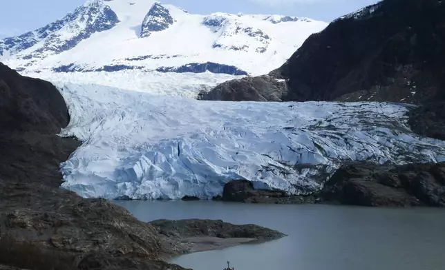 FILE - The face of the Mendenhall Glacier on Sunday, April 21, 2024, in Juneau, Alaska. Voters in Alaska's capital city could decide in October whether to ban large cruise ships on Saturdays starting next year. Supporters of the proposal say it would give residents a reprieve from the crush of tourists drawn to attractions like Juneau's fast-retreating Mendenhall Glacier, but opponents say it would hurt local businesses and invite lawsuits. (AP Photo/Becky Bohrer, File)