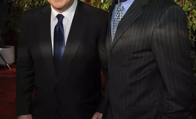 FILE - Alec Baldwin, left, and Billy Baldwin arrive at the 16th Annual Screen Actors Guild awards on Saturday, Jan. 23, 2010, in Los Angeles. Baldwin is going on trial for involuntary manslaughter after nearly 35 years in the public eye. (AP Photo/Vince Bucci, File)