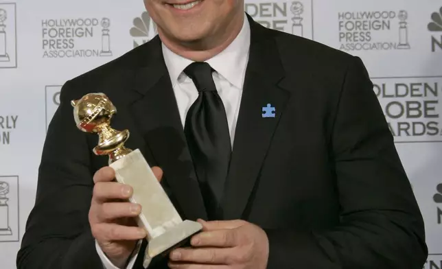 FILE - Alec Baldwin poses at the 64th Annual Golden Globe Awards on Monday, Jan. 15, 2007, in Beverly Hills, Calif. Baldwin is going on trial for involuntary manslaughter after nearly 35 years in the public eye. (AP Photo/Kevork Djansezian, File)