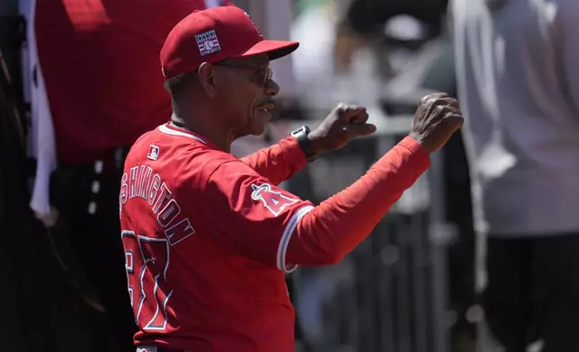 Los Angeles Angels manager Ron Washington gestures toward players during the seventh inning of a baseball game against the Oakland Athletics in Oakland, Calif., Saturday, July 20, 2024. (AP Photo/Jeff Chiu)