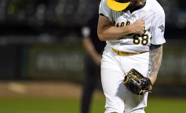 Oakland Athletics pitcher Joey Estes reacts after striking out Los Angeles Angels' Taylor Ward to end a baseball game Wednesday, July 3, 2024, in Oakland, Calif. The Athletics won 5-0. (AP Photo/Godofredo A. Vásquez)