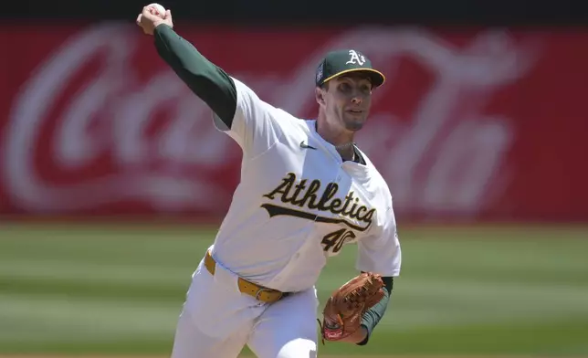 Oakland Athletics pitcher Mitch Spence works against the Los Angeles Angels during the first inning of a baseball game in Oakland, Calif., Saturday, July 20, 2024. (AP Photo/Jeff Chiu)