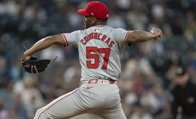 Los Angeles Angels reliever Roansy Contreras delivers a pitch during the ninth inning of a baseball game against the Seattle Mariners, Tuesday, July 23, 2024, in Seattle. (AP Photo/Stephen Brashear)