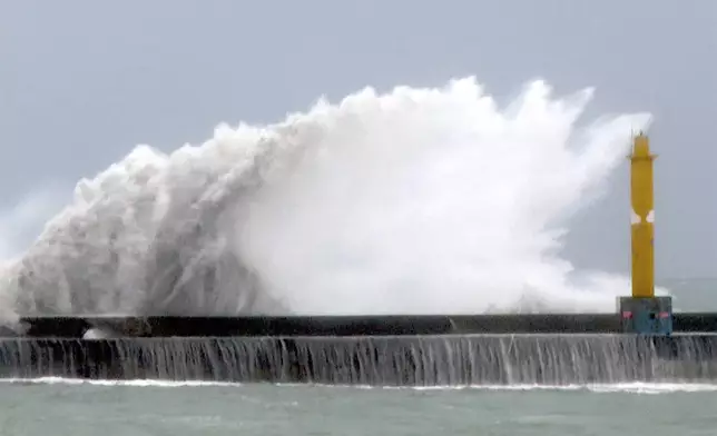 Waves crash onto the coastline before typhoon Gaemi makes landfall in northeastern Taiwan's Yilan county on Wednesday, Nov. 24, 2024. Taiwan has shuttered offices, schools and tourist sites across the island ahead of a powerful typhoon due to make landfall later Wednesday. (AP Photo/Johnson Lai)