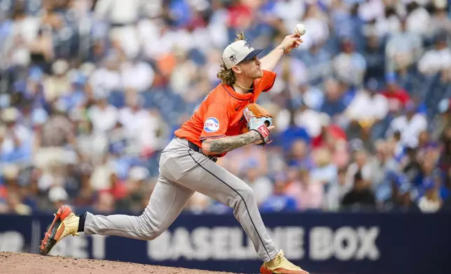 Houston Astros pitcher Josh Hader pitches against the Toronto Blue Jays during ninth-inning baseball game action in Toronto, Thursday, July 4, 2024. (Christopher Katsarov/The Canadian Press via AP)