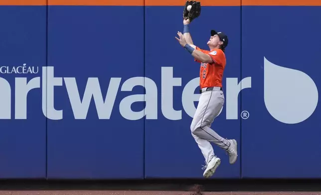 Houston Astros outfielder Jake Meyers catches a ball hit by New York Mets' Francisco Lindor during the seventh inning of a baseball game, Sunday, June 30, 2024, in New York. (AP Photo/Pamela Smith)