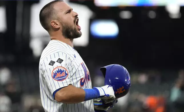 New York Mets' Luis Torrens reacts after grounding out during the ninth inning of a baseball game against the Houston Astros, Sunday, June 30, 2024, in New York. (AP Photo/Pamela Smith)
