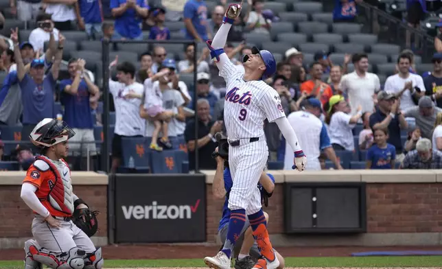 New York Mets' Brandon Nimmo (9) celebrates after hitting a home run during the seventh inning of a baseball game against the Houston Astros, Sunday, June 30, 2024, in New York. (AP Photo/Pamela Smith)