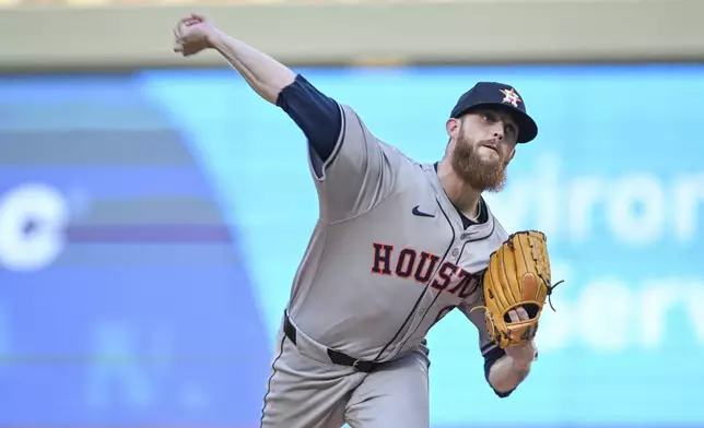 Houston Astros starting pitcher Shawn Dubin throws against the Minnesota Twins during the first inning of a baseball game Friday, July 5, 2024, in Minneapolis. (AP Photo/Craig Lassig)