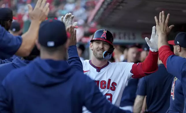 Los Angeles Angels' Taylor Ward (3) celebrates after hitting a home run during the first inning of a baseball game against the Oakland Athletics in Anaheim, Calif., Friday, July 26, 2024. (AP Photo/Eric Thayer)