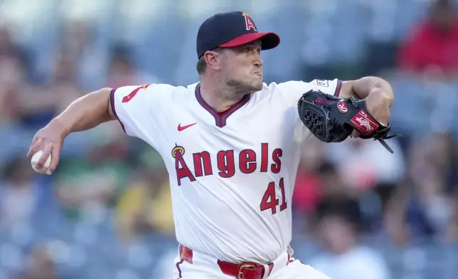 Los Angeles Angels starting pitcher Carson Fulmer throws during the first inning of a baseball game against the Oakland Athletics in Anaheim, Calif., Friday, July 26, 2024. (AP Photo/Eric Thayer)