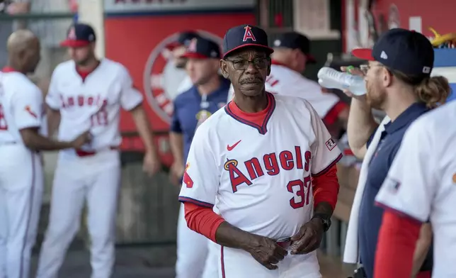 Los Angeles Angels manager Ron Washington (37) walks in the dugout before a baseball game against the Oakland Athletics in Anaheim, Calif., Friday, July 26, 2024. (AP Photo/Eric Thayer)