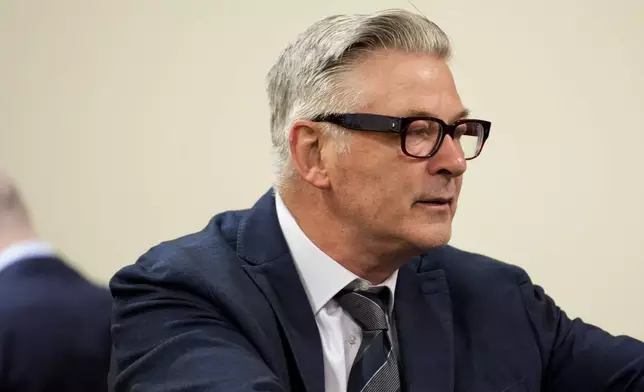 Alec Baldwin sits in court during his trial in Santa Fe, N.M., Thursday, July 11, 2024. Baldwin is facing a charge of involuntary manslaughter in the death of a cinematographer on the set of the film "Rust". (Ramsay de Give/Pool Photo via AP)