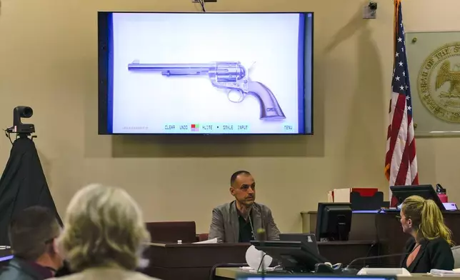 Firearms expert Alessandro Pietta testifies during actor Alec Baldwin's trial, Thursday, July 11, 2024, in Santa Fe, N.M. Baldwin is charged with involuntary manslaughter in the 2021 fatal shooting of cinematographer Halyna Hutchins during filming of the Western movie "Rust". (Ramsay de Give/Pool Photo via AP)