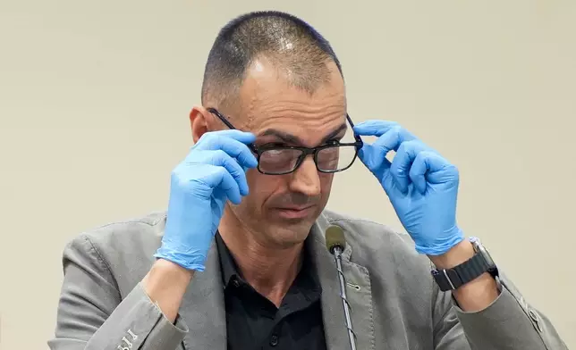Firearms expert Alessandro Pietta testifies during Alec Baldwin's trial, Thursday, July 11, 2024, in Santa Fe, N.M. Alec Baldwin is charged with involuntary manslaughter in the 2021 fatal shooting of cinematographer Halyna Hutchins during filming of the Western movie "Rust". (Ramsay de Give/Pool Photo via AP)