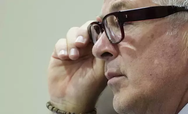 Alec Baldwin sits in court during his trial in Santa Fe, N.M., Thursday, July 11, 2024. Baldwin is facing a charge of involuntary manslaughter in the death of a cinematographer on the set of the film "Rust". (Ramsay de Give/Pool Photo via AP)