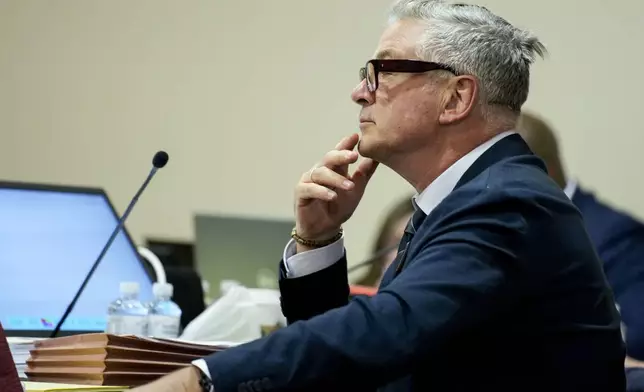 Alec Baldwin sits in court during his trial in Santa Fe, N.M., Thursday, July 11, 2024. Baldwin is facing a charge of involuntary manslaughter in the death of a cinematographer on the set of the film "Rust". (Ramsay de Give/Pool Photo via AP)
