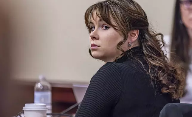 FILE - Hannah Gutierrez-Reed, the former armorer for the Western film "Rust," listens to closing arguments in her trial at district court, Wednesday, March 6, 2024, in Santa Fe, N.M. The movie weapons armorer is appealing her conviction for involuntary manslaughter in the fatal shooting of a cinematographer by Alec Baldwin on the set. (Luis Sánchez Saturno/Santa Fe New Mexican via AP, Pool, File)