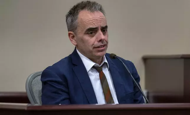 FILE - Director Joel Souza testifies in the trial against Hannah Gutierrez-Reed in state district court in Santa Fe, N.M., on Friday, March 1, 2024. Gutierrez-Reed was working as the armorer on the movie "Rust" when actor Alec Baldwin fatally shot cinematographer Halyna Hutchins and wounded Souza. (Eddie Moore/Albuquerque Journal via AP, Pool/File)