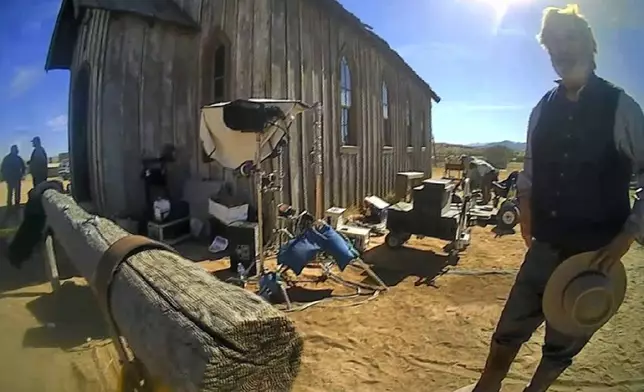 FILE - In this image taken from video released by the Santa Fe County Sheriff's Office, Alec Baldwin speaks with investigators following a fatal shooting on a movie set in Santa Fe, N.M. A New Mexico judge is considering an array of restrictions on evidence, testimony and arguments ahead of a trial for Alec Baldwin. The Monday, July 8, 2024, pretrial hearing sets the stage for Baldwin to appear in court this week on a single charge of involuntary manslaughter in the death of a cinematographer. (Santa Fe County Sheriff's Office via AP, File)